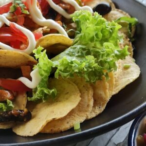 Mouth-watering nachos with fresh salsa, cheese, and delicious toppings. Perfect for appetizers or snacks.