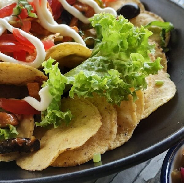 Mouth-watering nachos with fresh salsa, cheese, and delicious toppings. Perfect for appetizers or snacks.